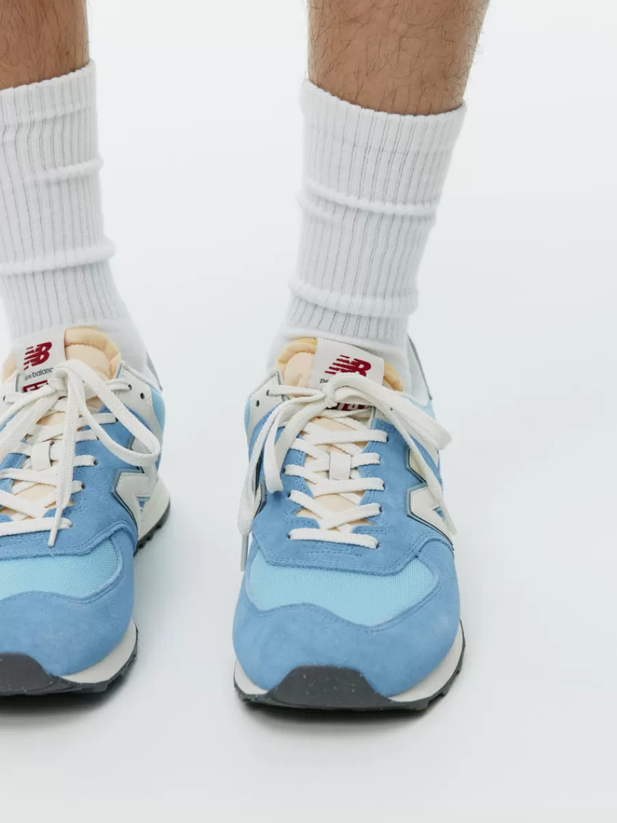 Shop ARKET New Balance 574 Trainers Light Blue