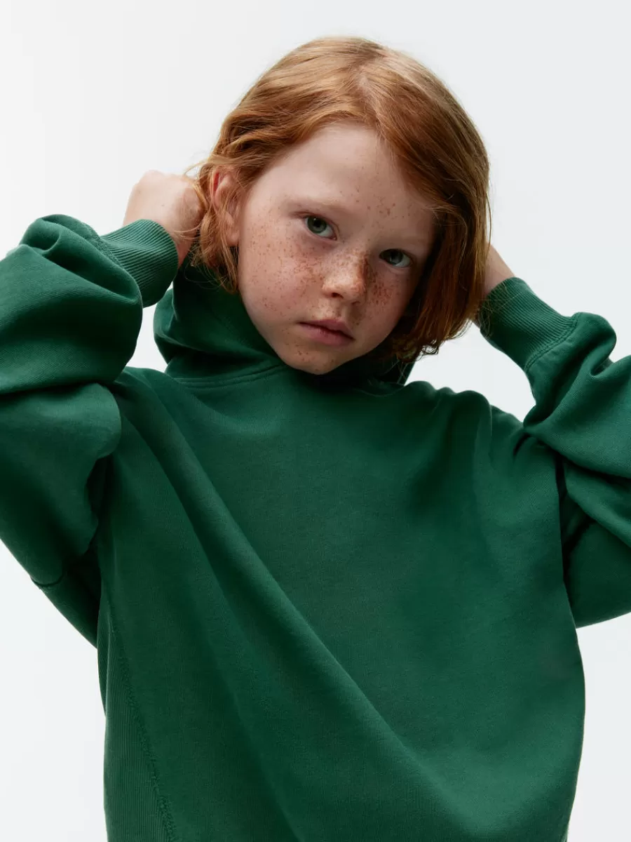 Shop ARKET Oversize Hooded Sweatshirt Dark Green