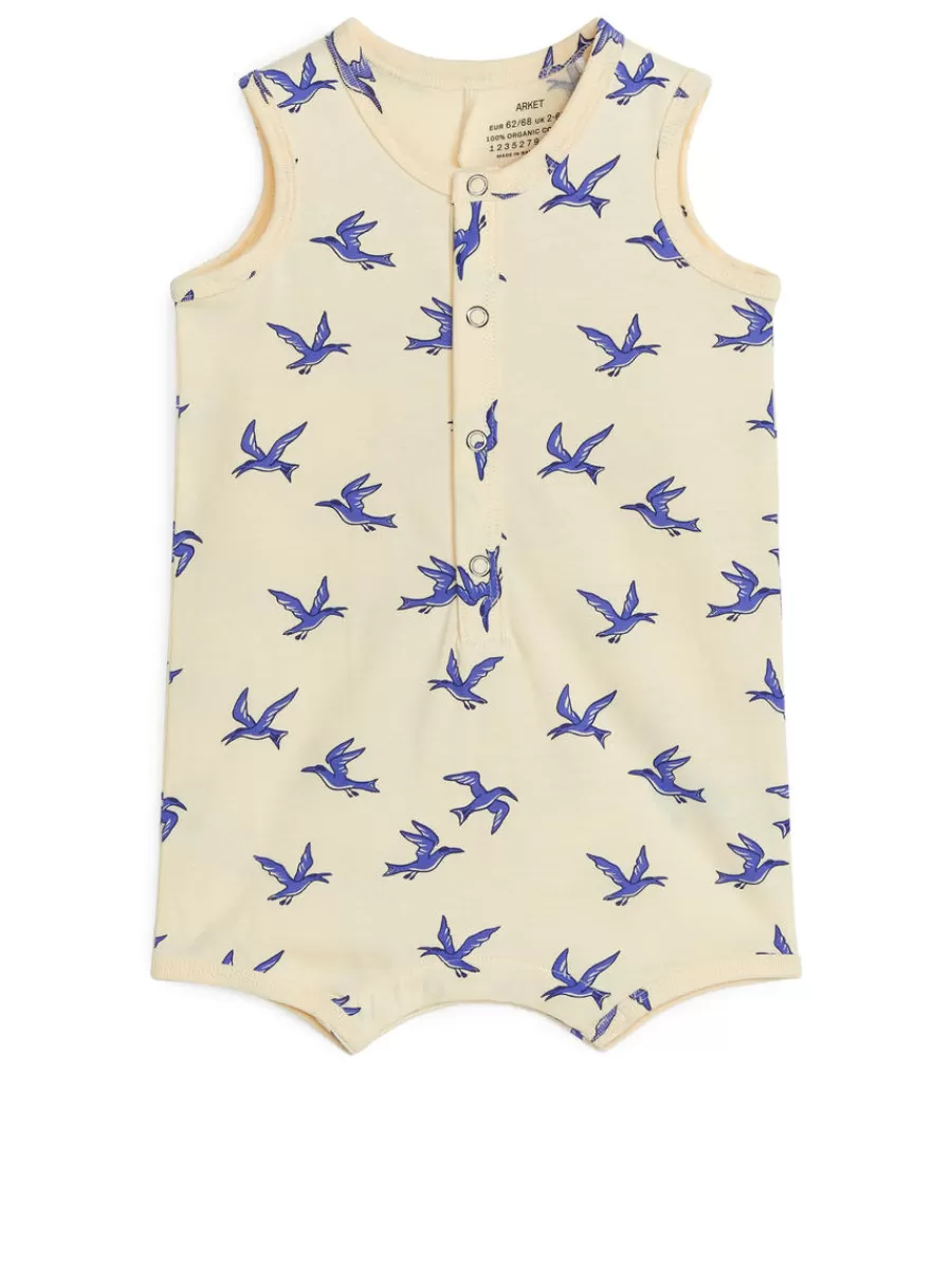 Shop ARKET Sleeveless Cotton Romper Pale Yellow
